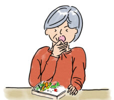 お弁当を食べてむせる摂食・嚥下障害の女性（セリフなし）
